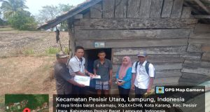 Peratin Pekon Kota Karang Pimpin Pembagian BLT-DD Secara Door To Door