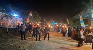 Babinsa Koramil 1204-13/Belitang Hulu Kawal Acara Pawai Obor Menyambut Bulan Suci Ramadhan 2024