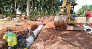 Sinergitas TNI Polri Bersama Masyarakat Dalam kegiatan TMMD Ke 121 Kodim 0424/Tanggamus