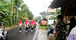 Dalam Rangka Menyambut HUT RI Ke – 79 Tahun,Prajurit Yonif 9 Mar Ikut Serta Mendukung Lomba Gerak Jalan