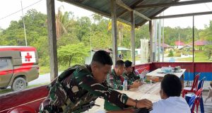 Satgas Yonif 763/SBA Berikan Pelayanan Kesehatan di Sekitar Pos Konja